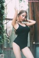 Beautiful Pichana Yoosuk shows off her figure in a black swimsuit (19 photos)